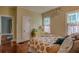 The bedroom features vibrant wall decor, hardwood floors, and sun-filled windows at 570 Park Se Ave, Atlanta, GA 30312