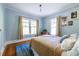 Cozy bedroom with hardwood floors, bright windows, and a comfortable atmosphere at 570 Park Se Ave, Atlanta, GA 30312