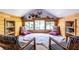 Bonus room with wood paneled walls, seating and windows at 570 Park Se Ave, Atlanta, GA 30312