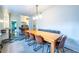 Bright dining area with built-in seating and wood table, adjacent to updated kitchen at 570 Park Se Ave, Atlanta, GA 30312