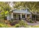 Charming home with a covered front porch, well-maintained landscaping, and a walkway leading to the entrance at 570 Park Se Ave, Atlanta, GA 30312