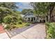 Charming home featuring a welcoming front porch with seating, a well-maintained lawn, and a private driveway at 570 Park Se Ave, Atlanta, GA 30312