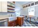 Modern kitchen featuring a center island, stainless steel appliances, breakfast nook, and checkered tile floors at 570 Park Se Ave, Atlanta, GA 30312