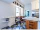 Eat-in kitchen featuring a center island, stainless appliances and breakfast nook with checkered tile floors at 570 Park Se Ave, Atlanta, GA 30312