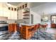 Modern kitchen with updated appliances, white cabinets, and breakfast bar seating at 570 Park Se Ave, Atlanta, GA 30312