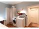 Well-organized laundry room featuring modern washer and dryer at 570 Park Se Ave, Atlanta, GA 30312