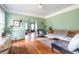 Spacious living room with hardwood floors, green walls, and an open layout at 570 Park Se Ave, Atlanta, GA 30312