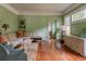 Comfortable living room with a sectional sofa, stylish decor, and hardwood floors at 570 Park Se Ave, Atlanta, GA 30312