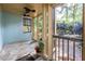 Charming screened porch with ceiling fans, offering a comfortable outdoor living space at 570 Park Se Ave, Atlanta, GA 30312