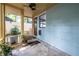 Cozy screened porch features a ceiling fan and serene views, blending indoor comfort with outdoor charm at 570 Park Se Ave, Atlanta, GA 30312