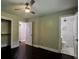 Bedroom with ceiling fan, hardwood floors, closet and bathroom with marble shower at 905 Hickory Ridge Sw Rd, Lilburn, GA 30047