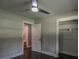 Bedroom with ceiling fan, hardwood floors, closet and bathroom with marble shower at 905 Hickory Ridge Sw Rd, Lilburn, GA 30047