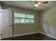 Bedroom featuring hardwood floors, neutral paint and bright natural light at 905 Hickory Ridge Sw Rd, Lilburn, GA 30047