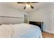 Bedroom with hardwood floors, ceiling fan, closet, shelf and neutral decor at 2232 Dunseath Nw Ave # 309, Atlanta, GA 30318