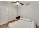 Bedroom featuring hardwood floors, closet with sliding doors and neutral decor at 2232 Dunseath Nw Ave # 309, Atlanta, GA 30318