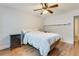Bedroom with hardwood floors, ceiling fan, closet and neutral decor at 2232 Dunseath Nw Ave # 309, Atlanta, GA 30318