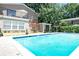 Sparkling community pool area with lounge chairs and shade, perfect for relaxation at 2232 Dunseath Nw Ave # 309, Atlanta, GA 30318