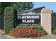 Sign at Clayburne Place is nicely landscaped with colorful flowers at 2232 Dunseath Nw Ave # 309, Atlanta, GA 30318