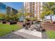 Enjoy relaxing outside by the condo on the patio area with lush landscaping and outdoor seating and an outdoor fire pit at 285 Centennial Olympic Park Nw Dr # 1407, Atlanta, GA 30313