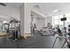 Community gym space with a variety of modern exercise equipment at 285 Centennial Olympic Park Nw Dr # 1407, Atlanta, GA 30313