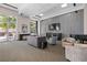 Community lounge area with comfortable seating, piano and large windows at 285 Centennial Olympic Park Nw Dr # 1407, Atlanta, GA 30313