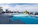 Take a refreshing dip in the sparkling pool, perfect for hot summer days, with lounge chairs and tables available at 285 Centennial Olympic Park Nw Dr # 1407, Atlanta, GA 30313