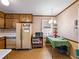 Vintage kitchen with ample cabinet space and room for a cozy dining nook at 784 San Miguel Dr, Stone Mountain, GA 30083