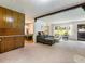 Large living room featuring plush carpets and great natural light at 784 San Miguel Dr, Stone Mountain, GA 30083