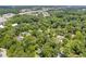 Aerial view of a neighborhood surrounded by lush trees, including a house at 3008 Ridgeside Ct, Atlanta, GA 30341