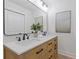 Double sink bathroom with modern fixtures and ample counter space at 3008 Ridgeside Ct, Atlanta, GA 30341