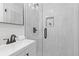 Modern bathroom featuring a sleek vanity, black hardware, and glass shower at 3008 Ridgeside Ct, Atlanta, GA 30341