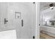 Stylish bathroom showcases glass shower, and a view into the bedroom space at 3008 Ridgeside Ct, Atlanta, GA 30341
