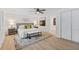 Clean bedroom features a ceiling fan, an area rug and entryway to another room at 3008 Ridgeside Ct, Atlanta, GA 30341