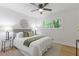 Comfortable bedroom features a ceiling fan, window, and stylish decor at 3008 Ridgeside Ct, Atlanta, GA 30341