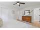 Bedroom featuring stylish dresser and en-suite bathroom with glass shower at 3008 Ridgeside Ct, Atlanta, GA 30341