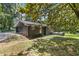 Exterior shot of the house with a well-maintained lawn and mature trees at 3008 Ridgeside Ct, Atlanta, GA 30341