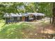 Landscaped front yard with walkway leading to the front door at 3008 Ridgeside Ct, Atlanta, GA 30341