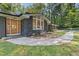Beautifully renovated house with brick and stone exterior, manicured lawn, and an inviting front entrance at 3008 Ridgeside Ct, Atlanta, GA 30341