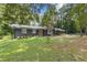 Charming home with mature trees and well-manicured lawn at 3008 Ridgeside Ct, Atlanta, GA 30341