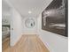 Bright hallway with an decorative art, a mirror and an entrance into a bedroom at 3008 Ridgeside Ct, Atlanta, GA 30341