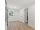 Hallway with door to the outside and view into the next room at 3008 Ridgeside Ct, Atlanta, GA 30341