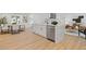 Open kitchen to dining and living room offers stainless appliances and luxury vinyl flooring at 3008 Ridgeside Ct, Atlanta, GA 30341