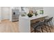 Bright kitchen with stainless steel appliances, a quartz countertop island, and modern finishes create a chef-ready space at 3008 Ridgeside Ct, Atlanta, GA 30341