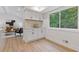 Kitchenette area showcases modern white cabinets and a view into the living area at 3008 Ridgeside Ct, Atlanta, GA 30341