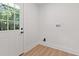 Mud room with a door to the backyard and connections for a washing machine and a dryer at 3008 Ridgeside Ct, Atlanta, GA 30341
