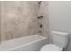 Bathroom with tiled shower and toilet offers modern comfort at 4000 Red Canoe Bnd, Lilburn, GA 30047