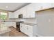 Kitchen featuring white cabinets, stainless steel appliances, granite countertops and large central island at 4000 Red Canoe Bnd, Lilburn, GA 30047