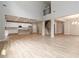 Bright, open-concept living room features hardwood floors, a gourmet kitchen and a staircase to the second floor at 4000 Red Canoe Bnd, Lilburn, GA 30047