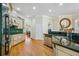 A bright kitchen offers custom cabinetry, dark countertops, and stainless steel appliances at 84 Nw Gloster Nw Rd, Lawrenceville, GA 30044