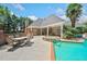 Inviting outdoor pool and patio area, perfect for relaxation and entertaining with an attached hot tub at 84 Nw Gloster Nw Rd, Lawrenceville, GA 30044